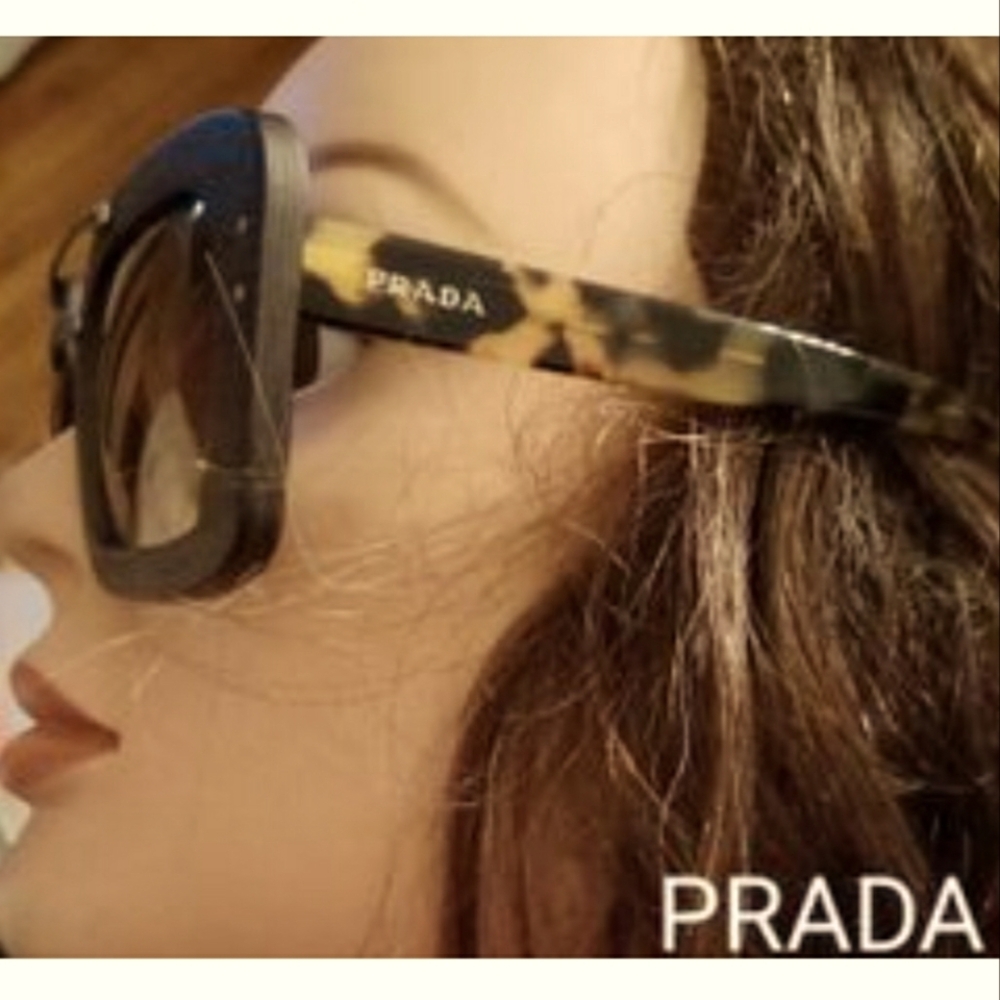 Prada Women's/Unisex Brown Sunglasses. Wood Like Frame.